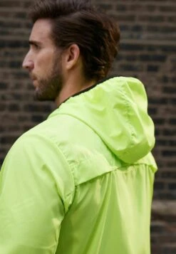 Next ACTIVE RUNNING - Leichte Jacke - Fluro Yellow -Next 4a3d097faa7d413d8a5f003a14fffc44